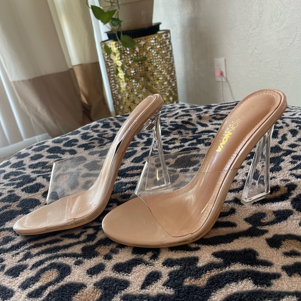 Clear high heels never worn